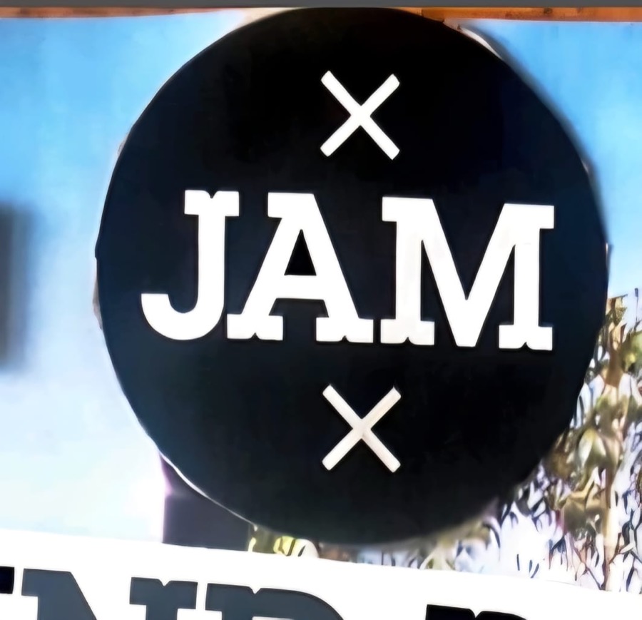 Rundes JAM-Abzeichen, schwarz mit weißer Schrift